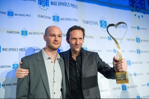 Festival co-director Philipp Bräuer and Max Ophüls Prize winner Rainer Frimmel